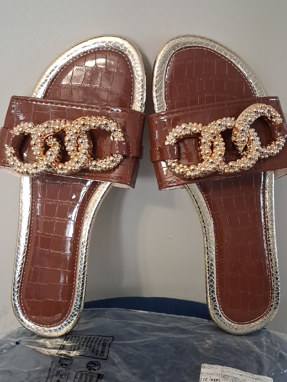 Women’s Brown Patent Slide Sandals with Gold Chain Accent